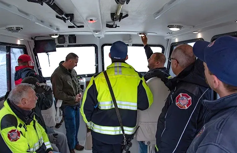 Aquatic Floating & Trucking  rescue crew on custom commercial boat build